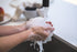 68547608f14e956de609e556_rinsing-soapy-hands-in-water_1751933173689.jpg